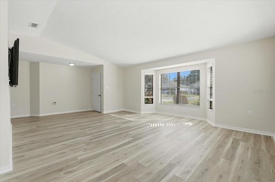 Welcome to this beautifully updated two-bedroom, two-bath home on Sandpiper Golf Club in Florida - for sale on GolfHomes.com, golf home, golf lot