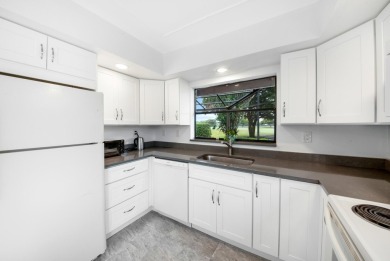 Welcome to this beautifully maintained 2-bedroom, 2.5-bathroom on Indian Spring Golf and Country Club in Florida - for sale on GolfHomes.com, golf home, golf lot