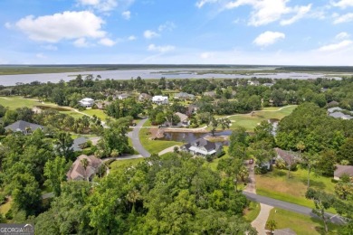 Nestled on a corner lot in the sought-after Oak Grove Island on Oak Grove Island Golf and Country Club in Georgia - for sale on GolfHomes.com, golf home, golf lot