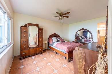 Step into paradise with this stunning 2-bedroom, 2-bathroom on Isla Del Sol Yacht and Country Club in Florida - for sale on GolfHomes.com, golf home, golf lot