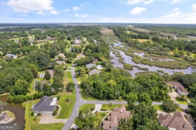 Nestled on a corner lot in the sought-after Oak Grove Island on Oak Grove Island Golf and Country Club in Georgia - for sale on GolfHomes.com, golf home, golf lot