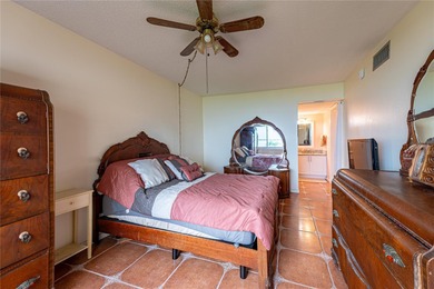 Step into paradise with this stunning 2-bedroom, 2-bathroom on Isla Del Sol Yacht and Country Club in Florida - for sale on GolfHomes.com, golf home, golf lot