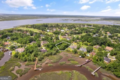 Nestled on a corner lot in the sought-after Oak Grove Island on Oak Grove Island Golf and Country Club in Georgia - for sale on GolfHomes.com, golf home, golf lot