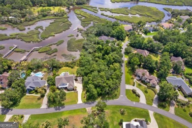 Nestled on a corner lot in the sought-after Oak Grove Island on Oak Grove Island Golf and Country Club in Georgia - for sale on GolfHomes.com, golf home, golf lot