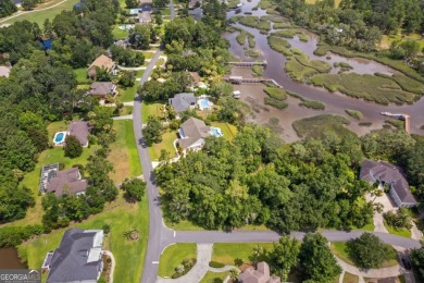 Nestled on a corner lot in the sought-after Oak Grove Island on Oak Grove Island Golf and Country Club in Georgia - for sale on GolfHomes.com, golf home, golf lot