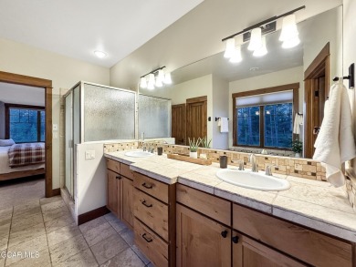 Tucked away on nearly acreage in Pole Creek Meadows, this on Pole Creek Golf Club in Colorado - for sale on GolfHomes.com, golf home, golf lot