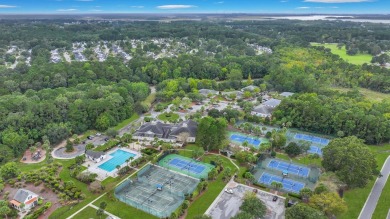 This pristine move-in ready, ground level (no stairs) on Dunes West Golf Club in South Carolina - for sale on GolfHomes.com, golf home, golf lot