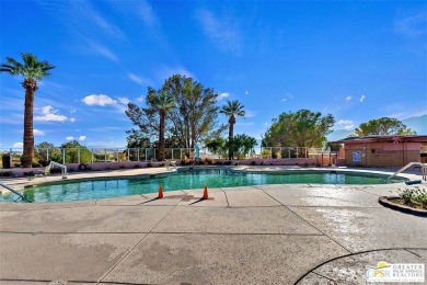 You can have the ultimate Desert living experience in this on Desert Crest Country Club in California - for sale on GolfHomes.com, golf home, golf lot