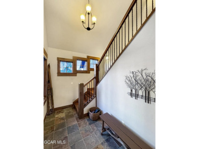Tucked away on nearly acreage in Pole Creek Meadows, this on Pole Creek Golf Club in Colorado - for sale on GolfHomes.com, golf home, golf lot