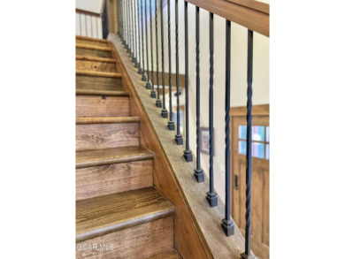 Tucked away on nearly acreage in Pole Creek Meadows, this on Pole Creek Golf Club in Colorado - for sale on GolfHomes.com, golf home, golf lot