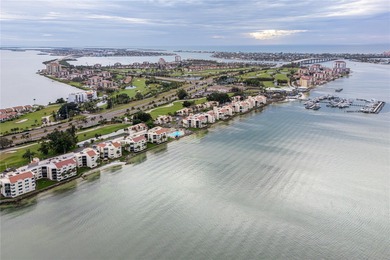 BIG Price IMPROVEMENT!! Step into paradise with this stunning on Isla Del Sol Yacht and Country Club in Florida - for sale on GolfHomes.com, golf home, golf lot