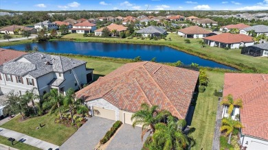 Live in Luxury in this spacious 2 Bedroom + Den single-story on Esplanade Golf and Country at Lakewood Ranch in Florida - for sale on GolfHomes.com, golf home, golf lot