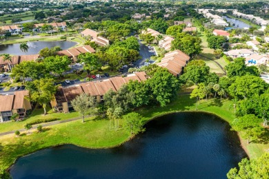 REDUCED*Lake Views from this1st Floor Corner Garden Condo on the on Boca Delray Golf and Country Club in Florida - for sale on GolfHomes.com, golf home, golf lot