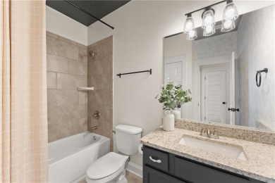 Move-in ready and better than new, this six-bedroom on Traditions of Braselton Golf Club in Georgia - for sale on GolfHomes.com, golf home, golf lot