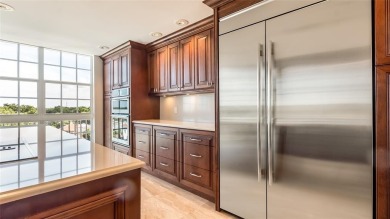 Experience true penthouse living in this exceptional top-floor on Palm-Aire Country Club and Resort - The Oaks in Florida - for sale on GolfHomes.com, golf home, golf lot