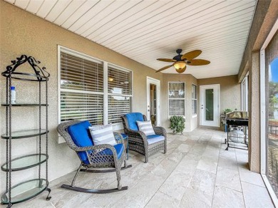 IN THE ESTATES OF BLACK BEAR RESERVE, A CHARMING HOME SITS ON on Black Bear Golf Club in Florida - for sale on GolfHomes.com, golf home, golf lot