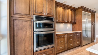 Experience true penthouse living in this exceptional top-floor on Palm-Aire Country Club and Resort - The Oaks in Florida - for sale on GolfHomes.com, golf home, golf lot