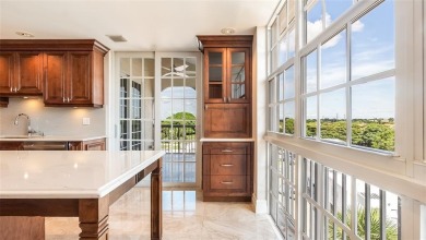 Experience true penthouse living in this exceptional top-floor on Palm-Aire Country Club and Resort - The Oaks in Florida - for sale on GolfHomes.com, golf home, golf lot