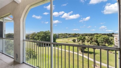 Experience true penthouse living in this exceptional top-floor on Palm-Aire Country Club and Resort - The Oaks in Florida - for sale on GolfHomes.com, golf home, golf lot