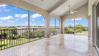 Experience true penthouse living in this exceptional top-floor on Palm-Aire Country Club and Resort - The Oaks in Florida - for sale on GolfHomes.com, golf home, golf lot
