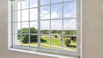 Experience true penthouse living in this exceptional top-floor on Palm-Aire Country Club and Resort - The Oaks in Florida - for sale on GolfHomes.com, golf home, golf lot