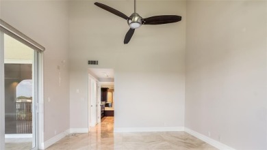 Experience true penthouse living in this exceptional top-floor on Palm-Aire Country Club and Resort - The Oaks in Florida - for sale on GolfHomes.com, golf home, golf lot