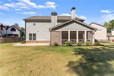 Move-in ready and better than new, this six-bedroom on Traditions of Braselton Golf Club in Georgia - for sale on GolfHomes.com, golf home, golf lot