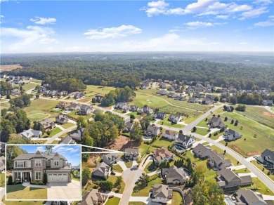 Move-in ready and better than new, this six-bedroom on Traditions of Braselton Golf Club in Georgia - for sale on GolfHomes.com, golf home, golf lot