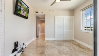 Experience true penthouse living in this exceptional top-floor on Palm-Aire Country Club and Resort - The Oaks in Florida - for sale on GolfHomes.com, golf home, golf lot
