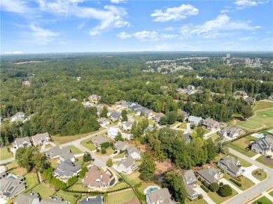 Move-in ready and better than new, this six-bedroom on Traditions of Braselton Golf Club in Georgia - for sale on GolfHomes.com, golf home, golf lot
