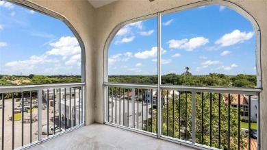 Experience true penthouse living in this exceptional top-floor on Palm-Aire Country Club and Resort - The Oaks in Florida - for sale on GolfHomes.com, golf home, golf lot