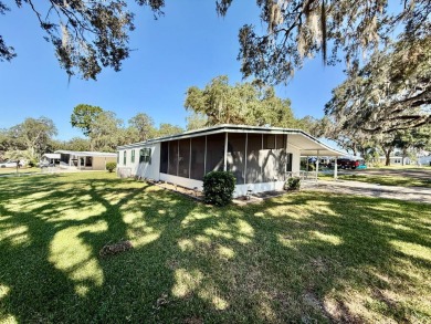 Home is located in Water Oak Country Club Estates in Lady Lake on Water Oak Country Club Estates in Florida - for sale on GolfHomes.com, golf home, golf lot