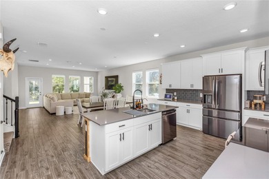 Only 20-minutes from Disney's iconic theme parks and all your on The Oasis Club at Champions Gate in Florida - for sale on GolfHomes.com, golf home, golf lot