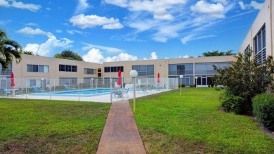 WELCOME TO THIS SPARKLING FULLY TILED CORNER CONDO AVAILABLE on Poinciana Golf Club in Florida - for sale on GolfHomes.com, golf home, golf lot