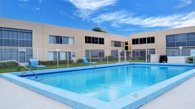 WELCOME TO THIS SPARKLING FULLY TILED CORNER CONDO AVAILABLE on Poinciana Golf Club in Florida - for sale on GolfHomes.com, golf home, golf lot