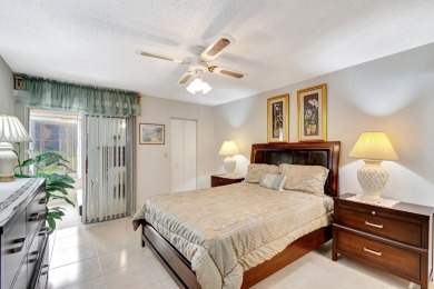 WELCOME TO THIS SPARKLING FULLY TILED CORNER CONDO AVAILABLE on Poinciana Golf Club in Florida - for sale on GolfHomes.com, golf home, golf lot