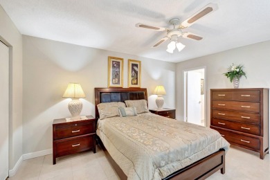 WELCOME TO THIS SPARKLING FULLY TILED CORNER CONDO AVAILABLE on Poinciana Golf Club in Florida - for sale on GolfHomes.com, golf home, golf lot