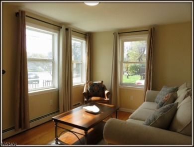 Completely renovated in 2020 this year round home sits on the on Lake Lackawanna Golf Course in New Jersey - for sale on GolfHomes.com, golf home, golf lot