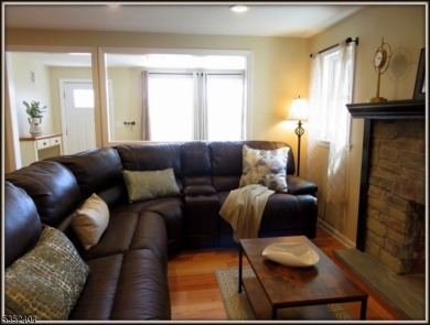 Completely renovated in 2020 this year round home sits on the on Lake Lackawanna Golf Course in New Jersey - for sale on GolfHomes.com, golf home, golf lot