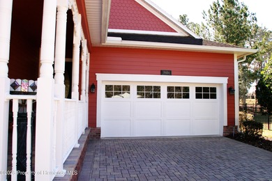 One or more photo(s) has been virtually staged. Nestled on a on Southern Hills Plantation Club in Florida - for sale on GolfHomes.com, golf home, golf lot