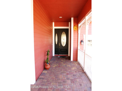 One or more photo(s) has been virtually staged. Nestled on a on Southern Hills Plantation Club in Florida - for sale on GolfHomes.com, golf home, golf lot