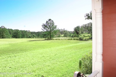 One or more photo(s) has been virtually staged. Nestled on a on Southern Hills Plantation Club in Florida - for sale on GolfHomes.com, golf home, golf lot