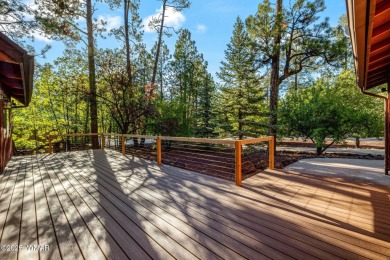 Escape to this premium cabin located on the twelfth fairway in on Pinetop Lakes Country Club in Arizona - for sale on GolfHomes.com, golf home, golf lot