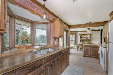 Peaceful retreat surrounded by trees and wildlife! Quaint 2 bed on Clarendon Country Club in Texas - for sale on GolfHomes.com, golf home, golf lot