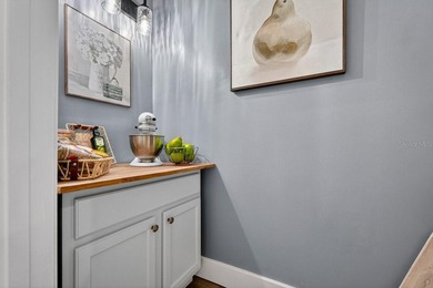 Under contract-accepting backup offers. BRAND NEW ROOF! on The Grand Club - Pine Lakes Course in Florida - for sale on GolfHomes.com, golf home, golf lot