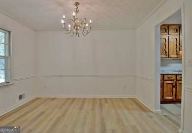 From the moment you walk into this home you know it has been on Canongate At Flat Creek Club in Georgia - for sale on GolfHomes.com, golf home, golf lot