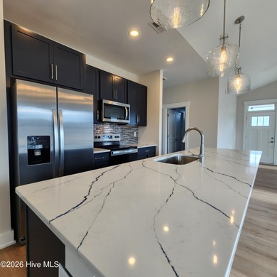 Have you been searching for a coastal cottage with clean lines on The Carolina Club in North Carolina - for sale on GolfHomes.com, golf home, golf lot