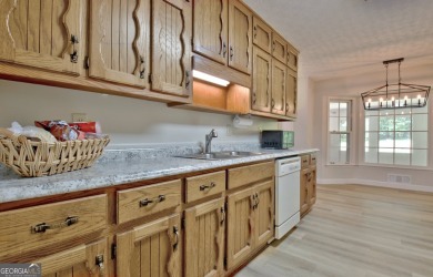 From the moment you walk into this home you know it has been on Canongate At Flat Creek Club in Georgia - for sale on GolfHomes.com, golf home, golf lot