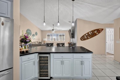 Under contract-accepting backup offers. BRAND NEW ROOF! on The Grand Club - Pine Lakes Course in Florida - for sale on GolfHomes.com, golf home, golf lot