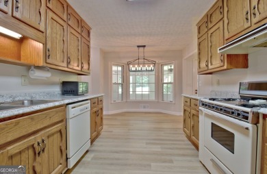 From the moment you walk into this home you know it has been on Canongate At Flat Creek Club in Georgia - for sale on GolfHomes.com, golf home, golf lot
